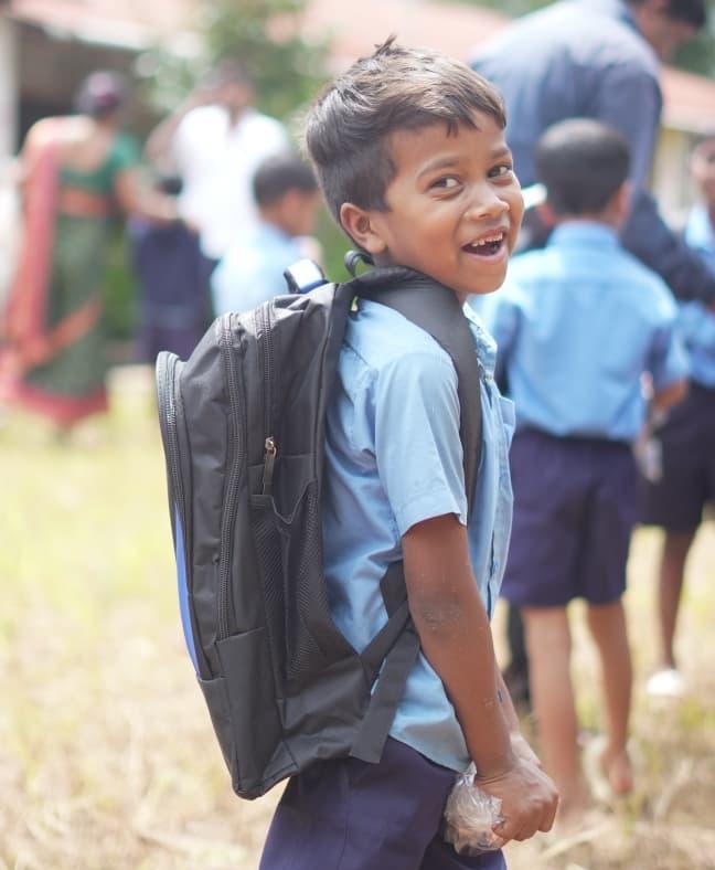 Child supported by Kautike