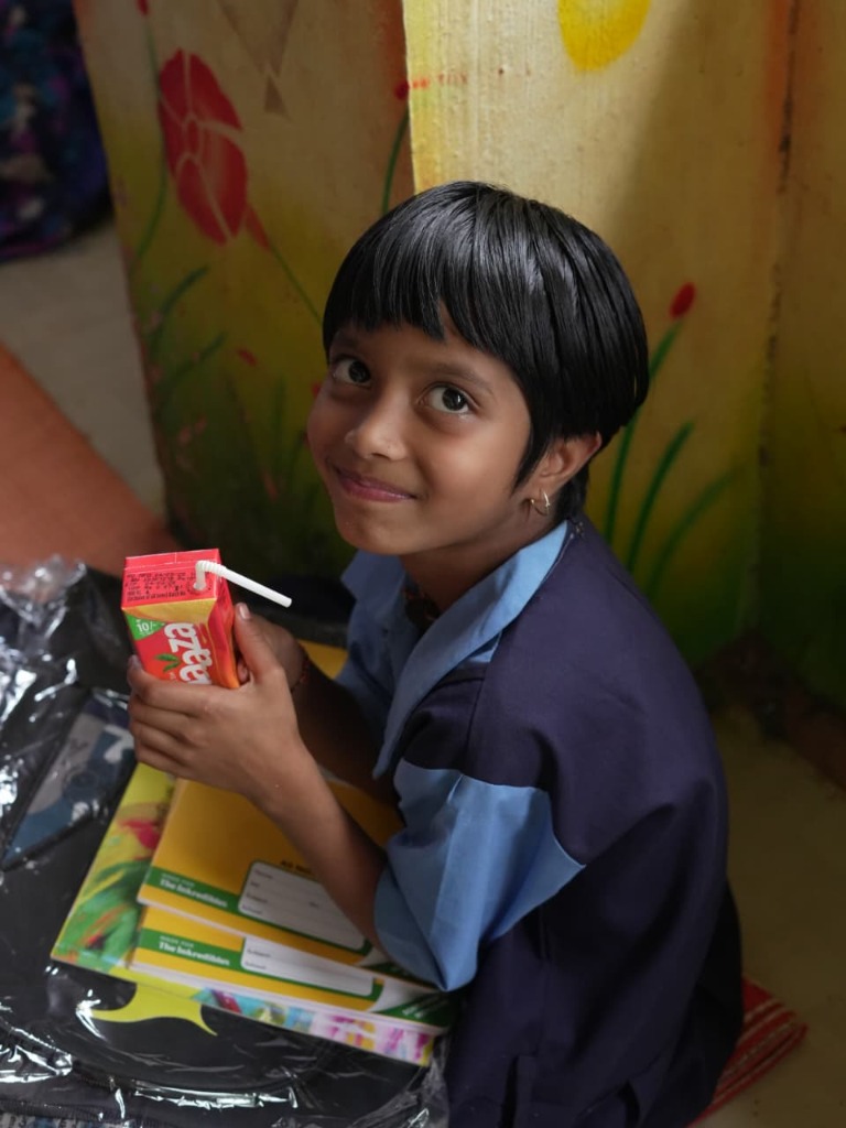Child supported by Kautike